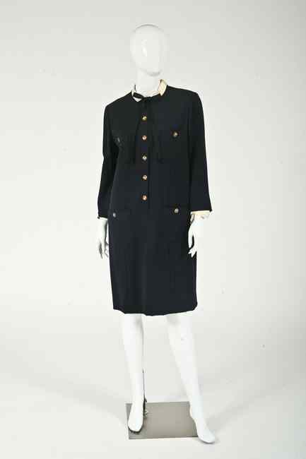 Appraisal: CHANEL BOUTIQUE NAVY SILK WOOL DRESS Size Gold-tone four-leaf clover