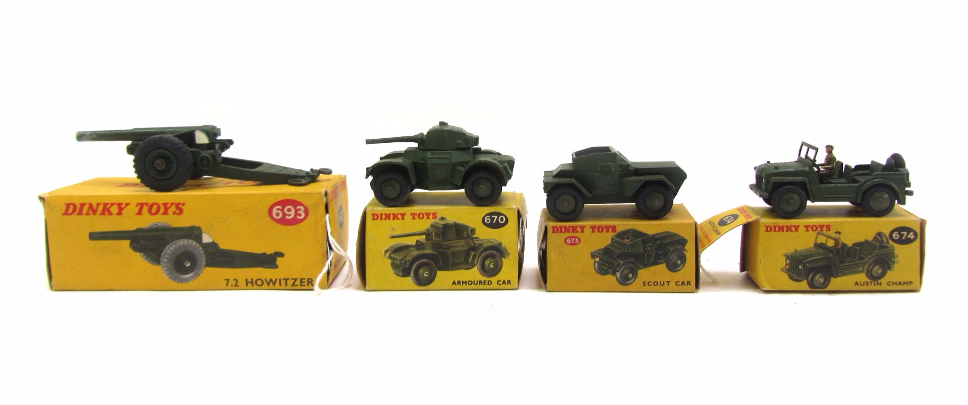 Appraisal: Four Dinky die-cast military vehicles comprising armored car scour car