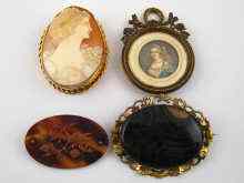 Appraisal: A mixed lot comprising four brooches including a yellow metal