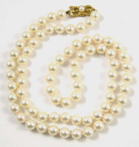 Appraisal: JAPANESE MIKIMOTO PEARL NECKLACE a inch strand of round well