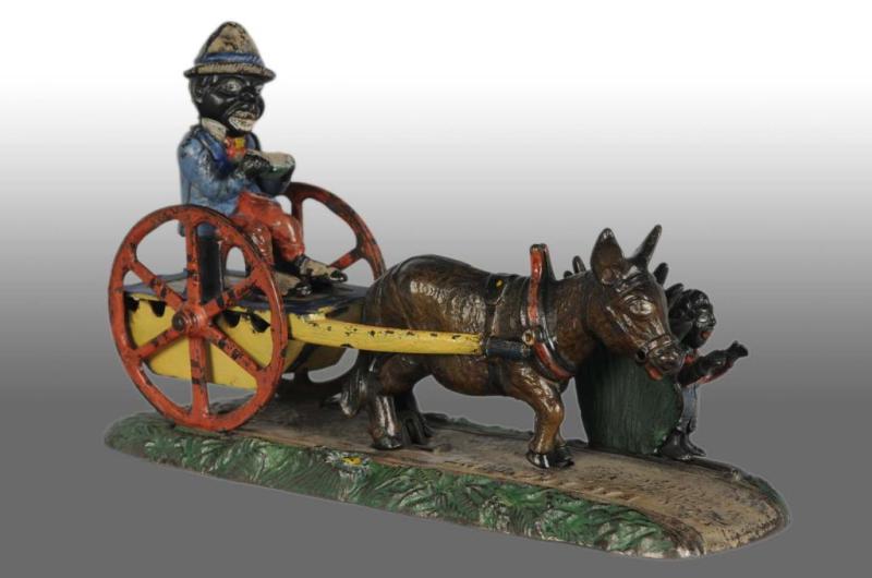 Appraisal: Cast Iron Bad Accident Mechanical Bank Description American Manufactured by