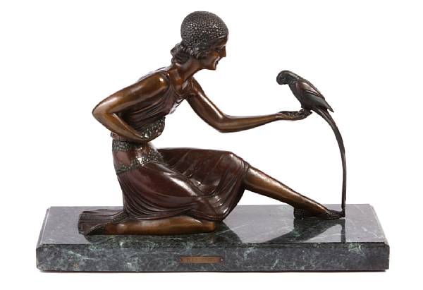 Appraisal: An Art Deco style patinated bronze figural group recast after