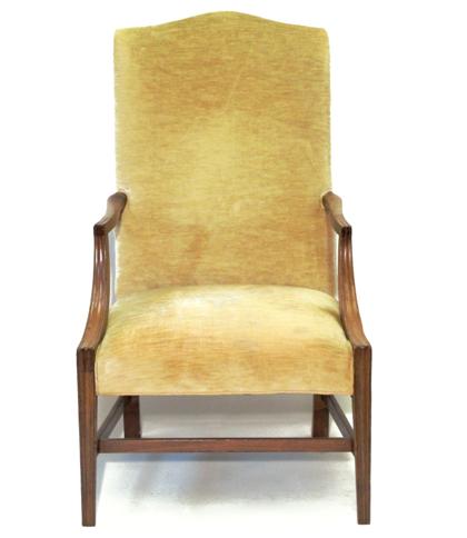 Appraisal: Federal mahogany lolling chair The arched upholstered back with shaped