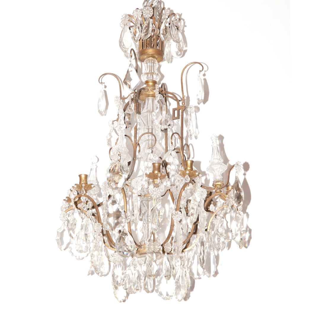 Appraisal: Louis XV Style Gilt-Bronze Eight-Light Chandelier The prism hung canopy