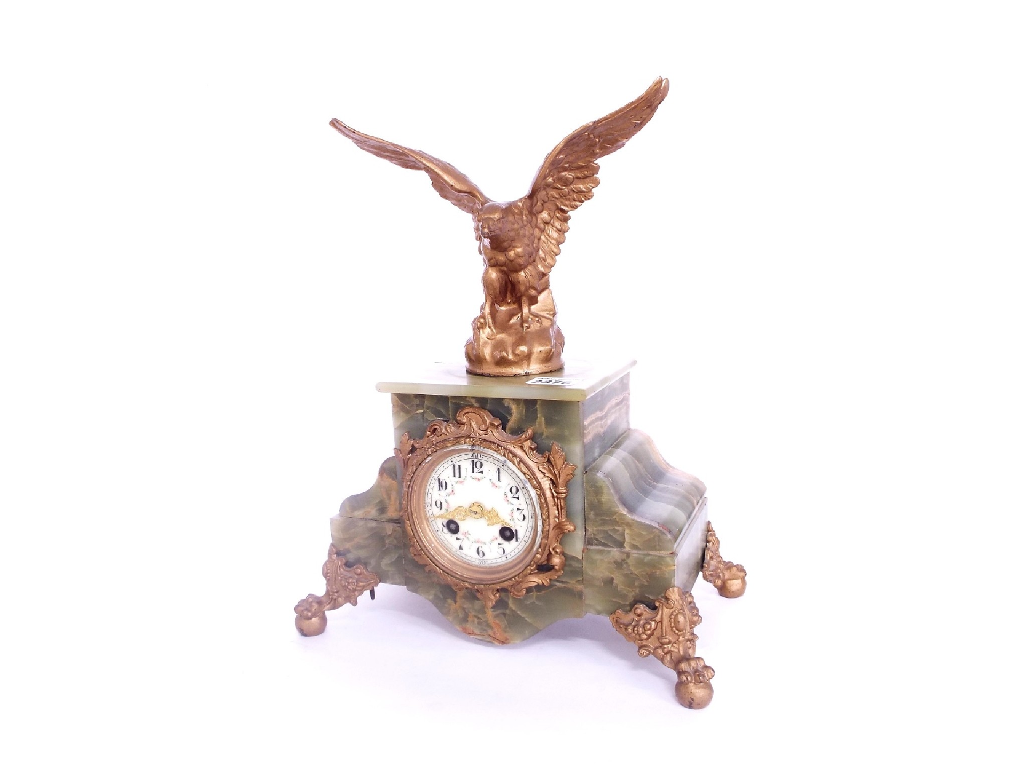 Appraisal: French onyx and gilt metal mounted two train mantel clock