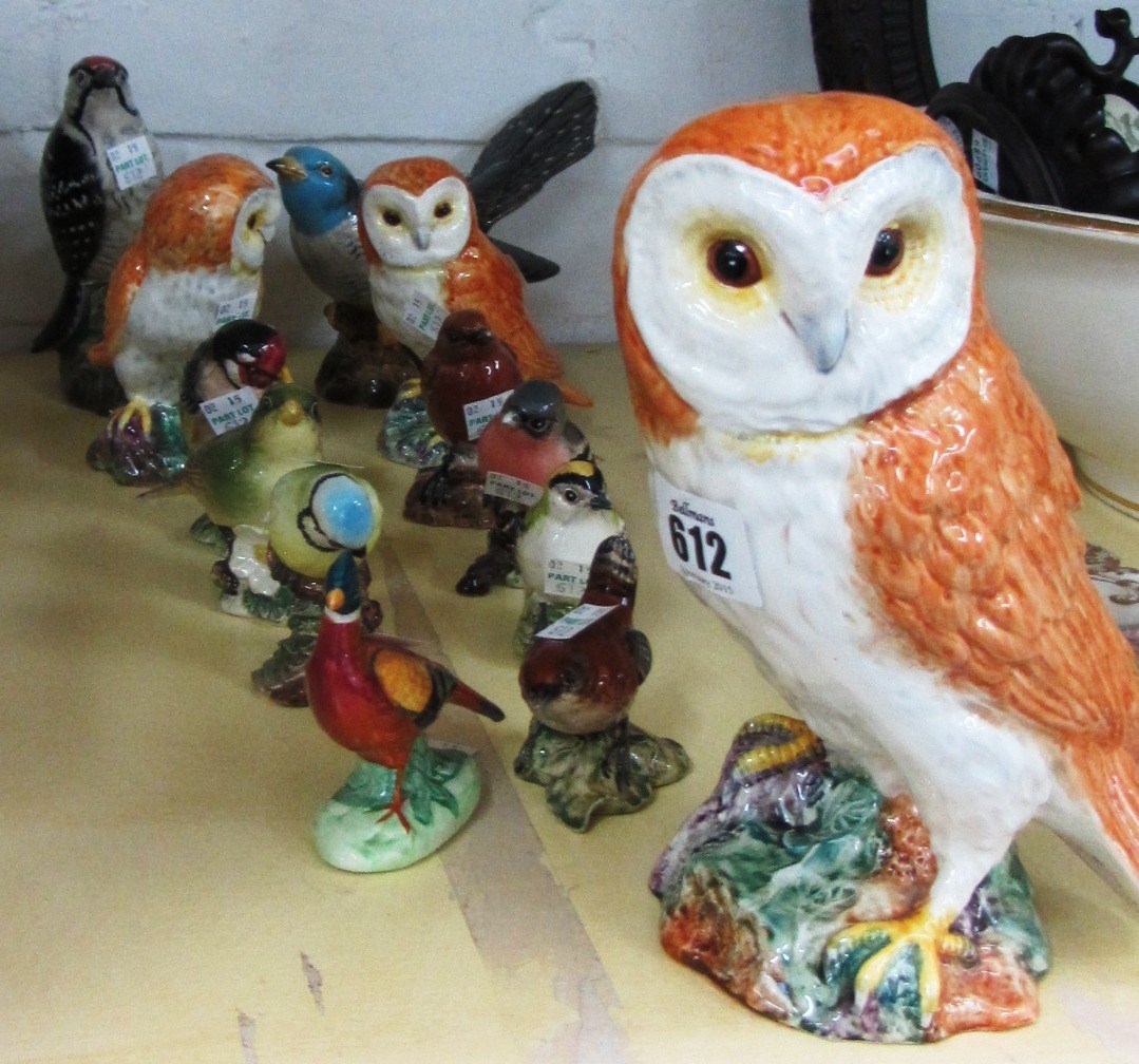 Appraisal: A quantity of Beswick birds comprising three Owls Lesser Spotted