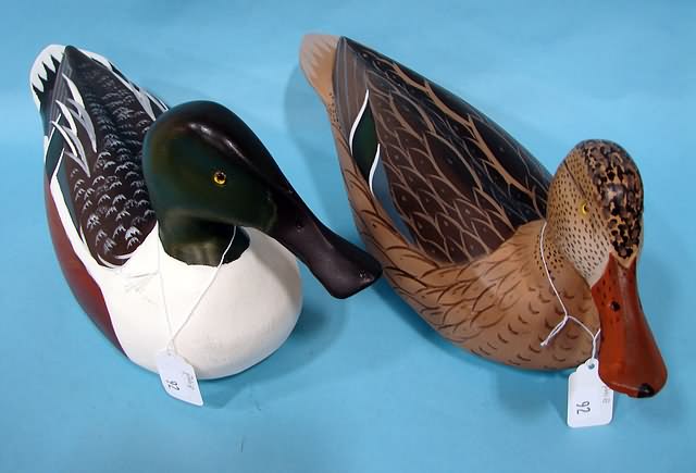 Appraisal: Pair of Gunning Shoveier decoys stamped on bottom WRG