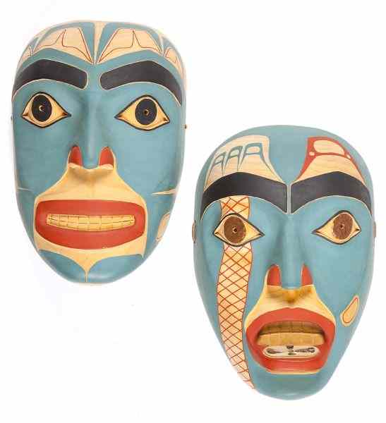 Appraisal: Pair of Tinglit Northwest Coast Maskscarved out of Alder wood