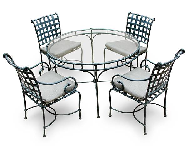 Appraisal: A Neoclassical style painted wrought iron table and four armchairs