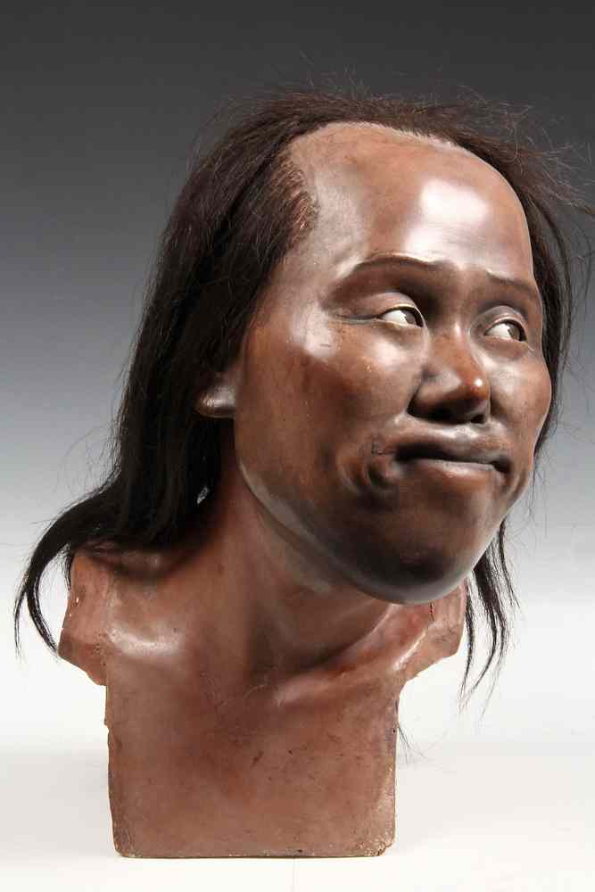 Appraisal: JAPANESE CARVING-of a man's head Natural History Believed to be