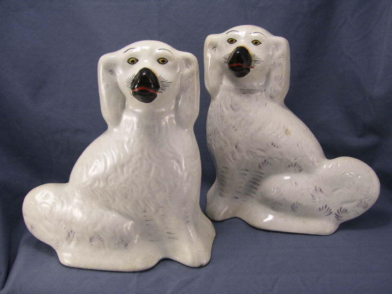 Appraisal: Pair Staffordshire Spaniels White spaniels one with chip on foot