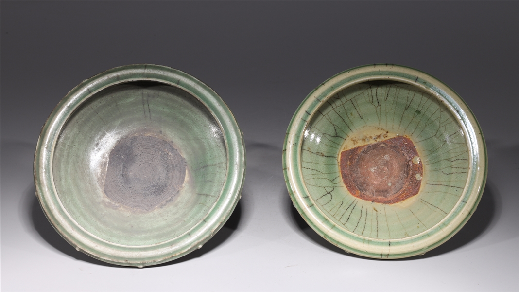 Appraisal: Pair of Chinese tripod dishes with green glaze both have