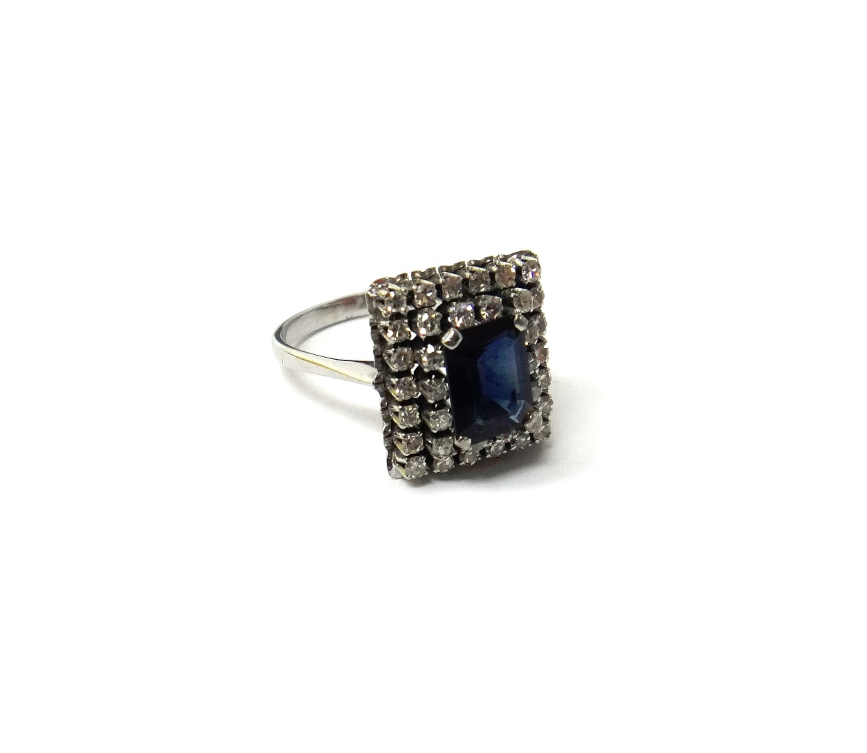 Appraisal: A white gold sapphire and diamond set rectangular cluster ring