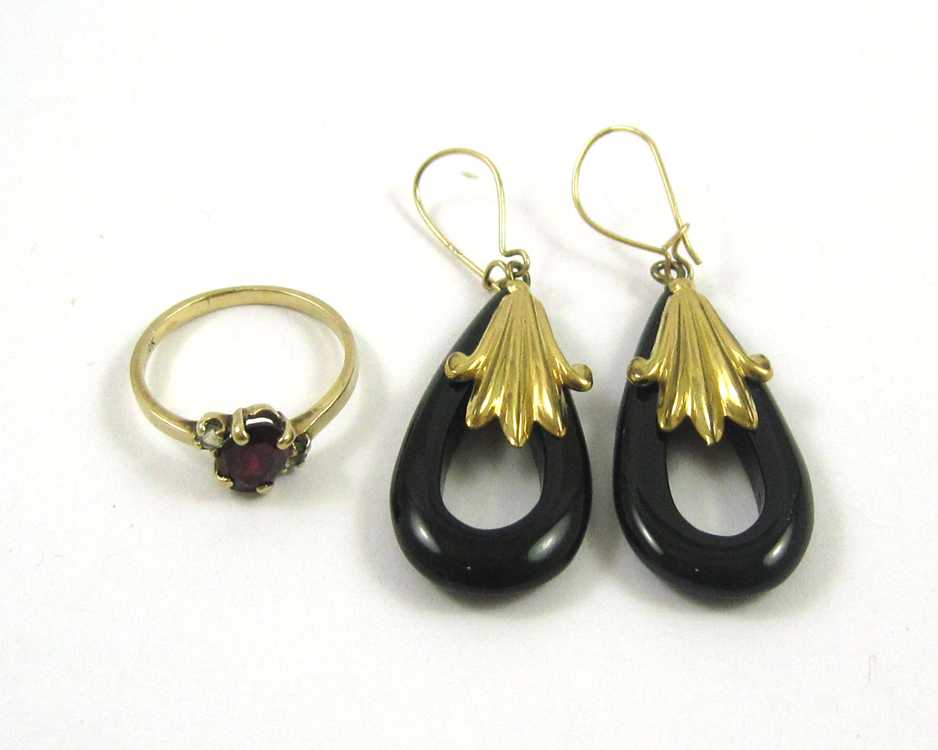 Appraisal: RING AND PAIR OF EARRINGS The dangle earrings with an