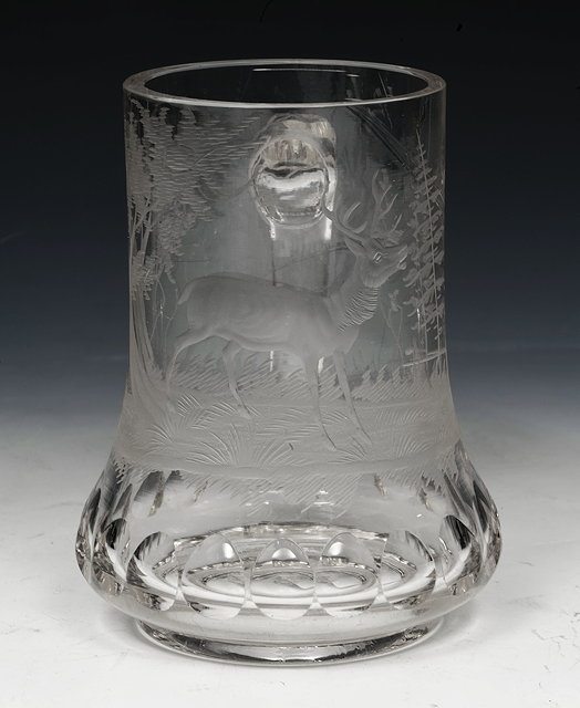 Appraisal: A GLASS TANKARD with intaglio cut stag design cm high