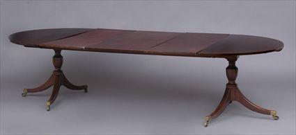 Appraisal: GEORGE III MAHOGANY TWO-PEDESTAL DINING TABLE The divided top with