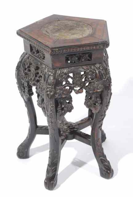 Appraisal: A CHINESE HARDWOOD SMALL HEXAGONAL URN TABLE with inset marble