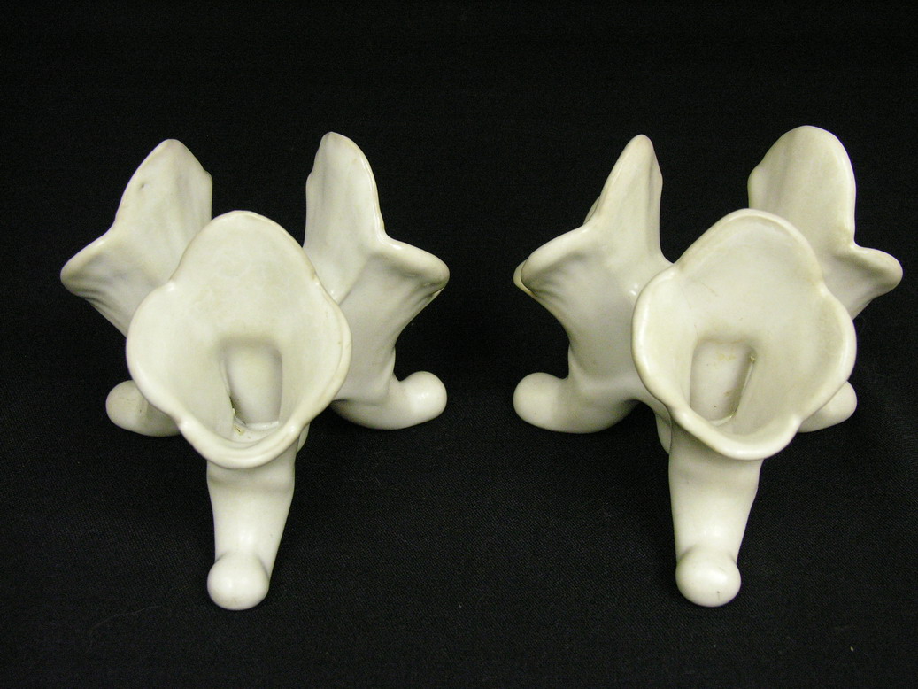 Appraisal: PAIR UNUSUAL VAN BRIGGLE CANDLE HOLDERS Combination candle holder flower