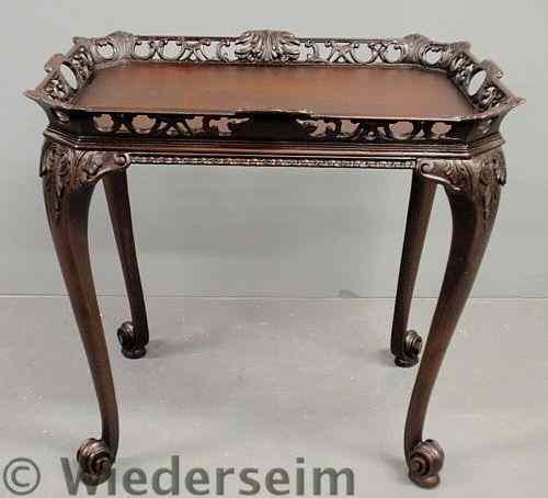 Appraisal: Georgian style mahogany tea table with a rectangular top h