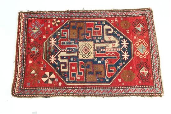 Appraisal: ORIENTAL RUG Twentieth century Caucasian Karabagh Red field and a