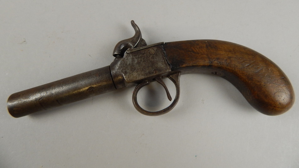 Appraisal: A thC muff type pistol with walnut stock unmarked cm