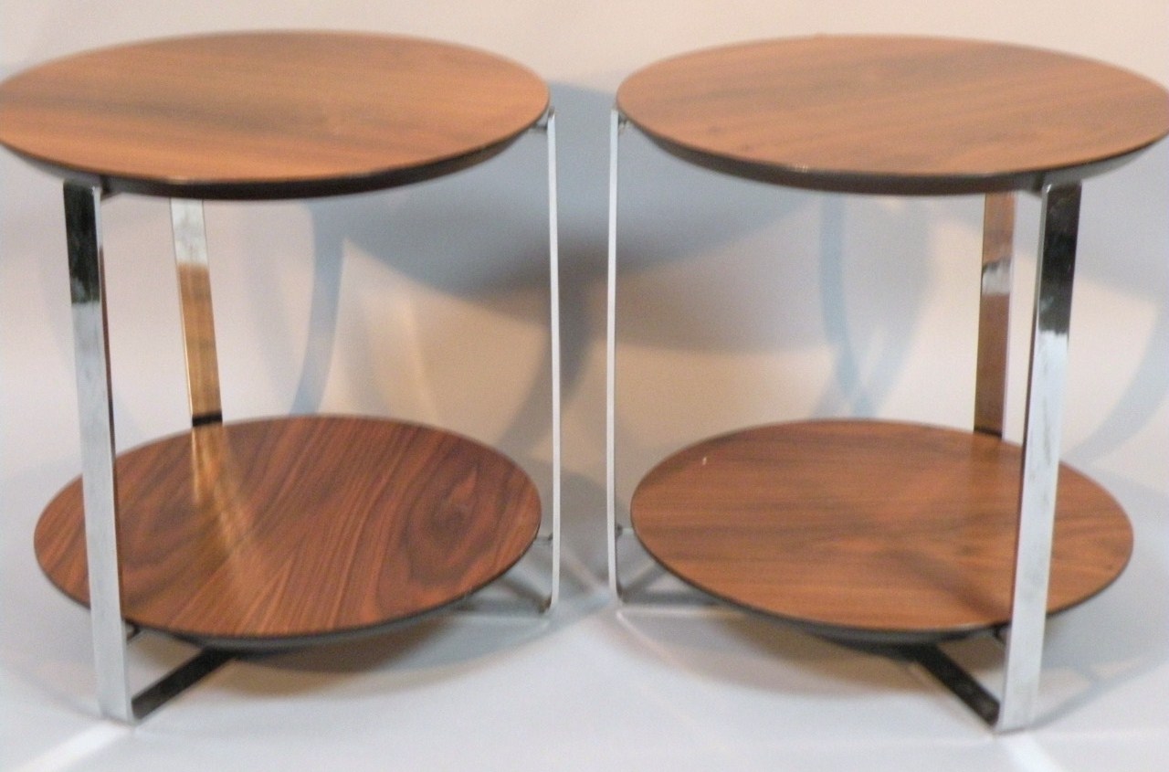 Appraisal: A pair of walnut design and ebonised retro coffee tables