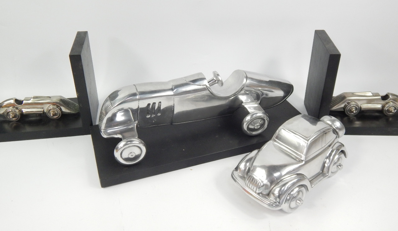 Appraisal: A chrome 's style race car ornament with pair of