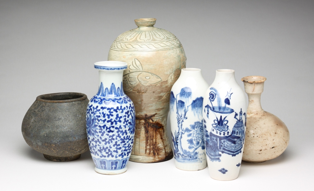 Appraisal: SIX PIECES OF ASIAN POTTERY Twentieth century and earlier Three