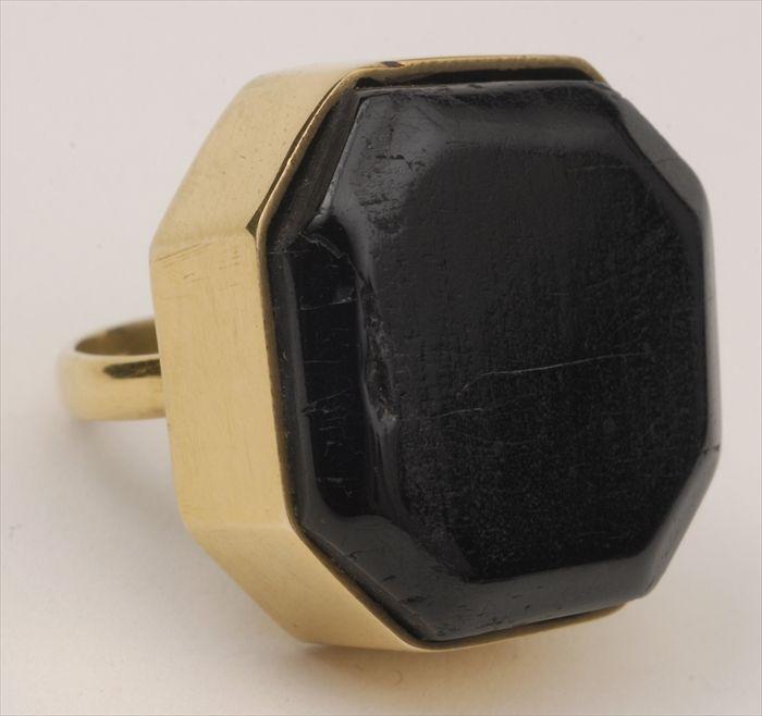 Appraisal: GOLD RING SET WITH LARGE BLACK STONE Stamped k approx