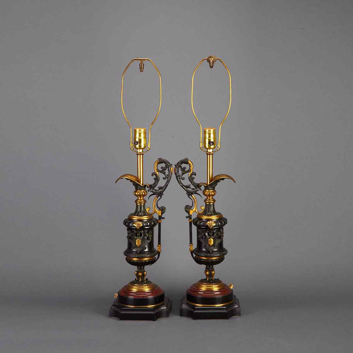 Appraisal: Pair of Victorian Patinated and GIlt Bronze Ewer Form Garniture