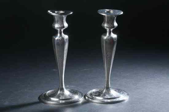 Appraisal: PAIR TIFFANY CO STERLING SILVER CANDLESTICKS Circa pattern Oval foot