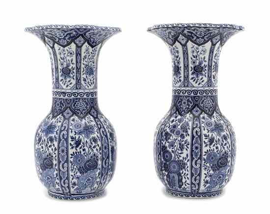 Appraisal: A Pair of Delft Ceramic Vases th century each of