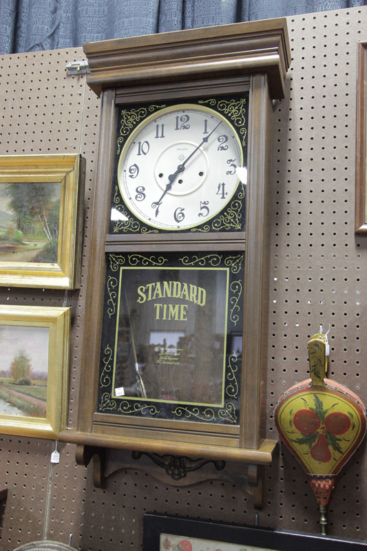 Appraisal: REPRODUCTION WALL CLOCK Eight day clock with tin dial brass