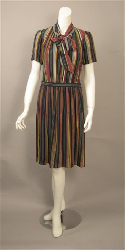 Appraisal: Two Yves Saint Laurent shirtwaist dresses s The first printed