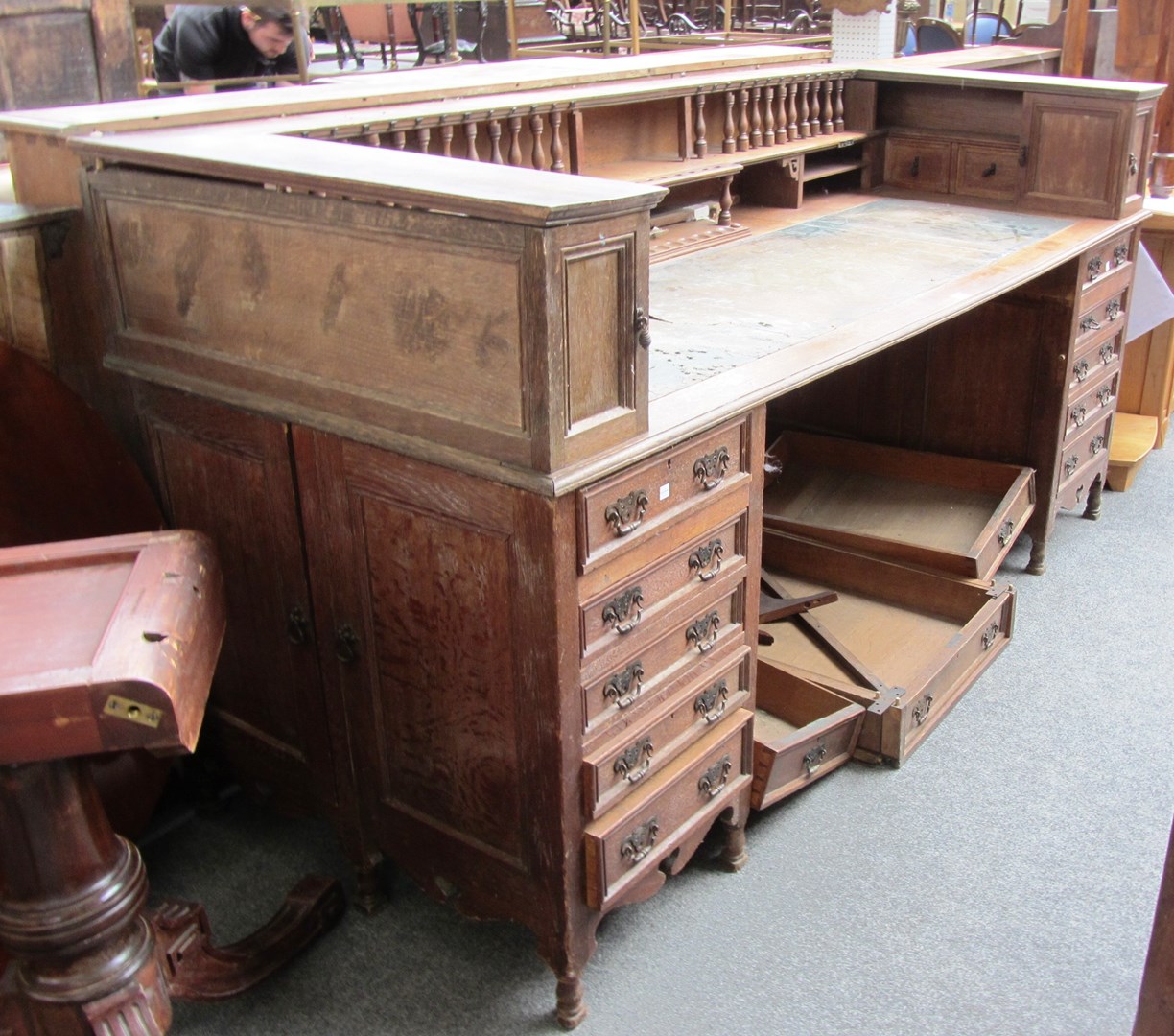 Appraisal: A large late th century oak desk with galleried superstructure