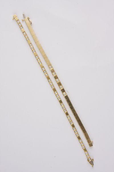 Appraisal: Two KT Yellow Gold Diamond Line Bracelets the first with