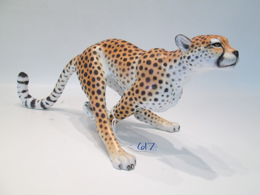 Appraisal: HEREND HAND PAINTED PORCELAIN CHEETAH SCULPTURE in running pose Herend