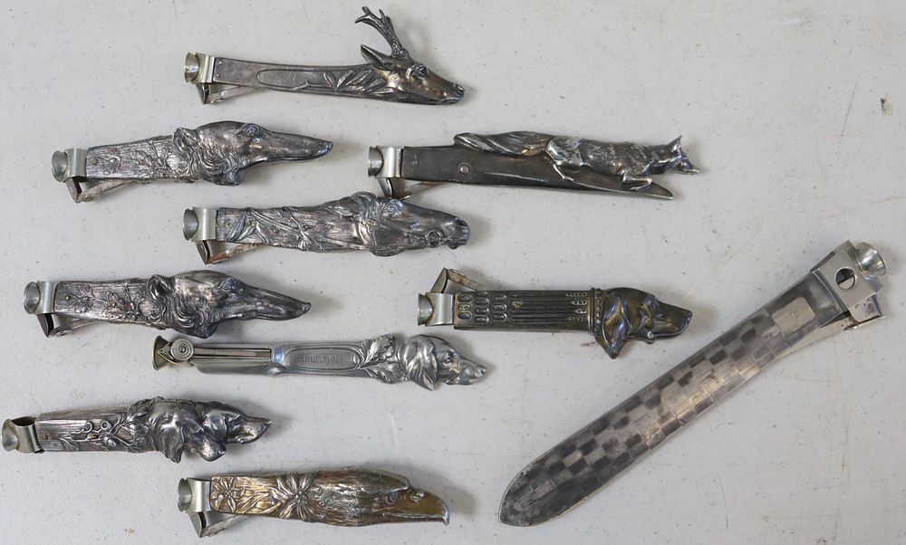 Appraisal: Lot Of Silvered Metal Cigar Cutters To inc Dogs Eagle