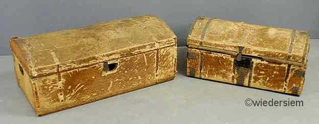 Appraisal: Two similar hide skin covered dome lid trunks each decorated