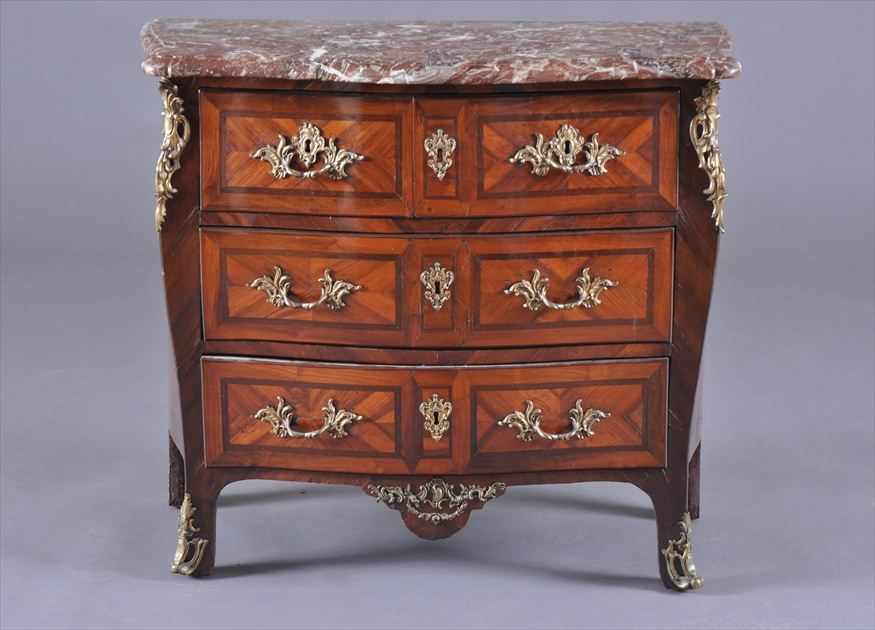 Appraisal: LOUIS XV GILT-METAL MOUNTED PURPLEWOOD AND TULIPWOOD PARQUETRY COMMODE The