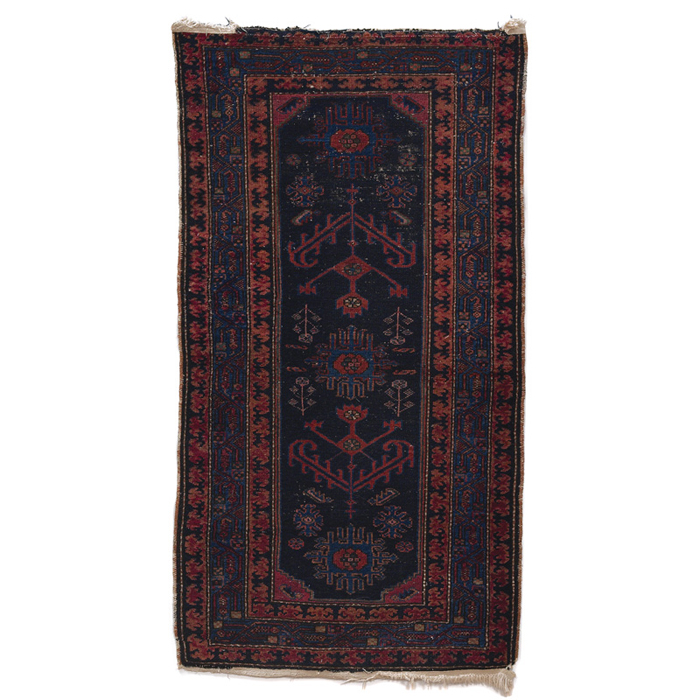 Appraisal: Persian rug c stylized floral design in blues and red