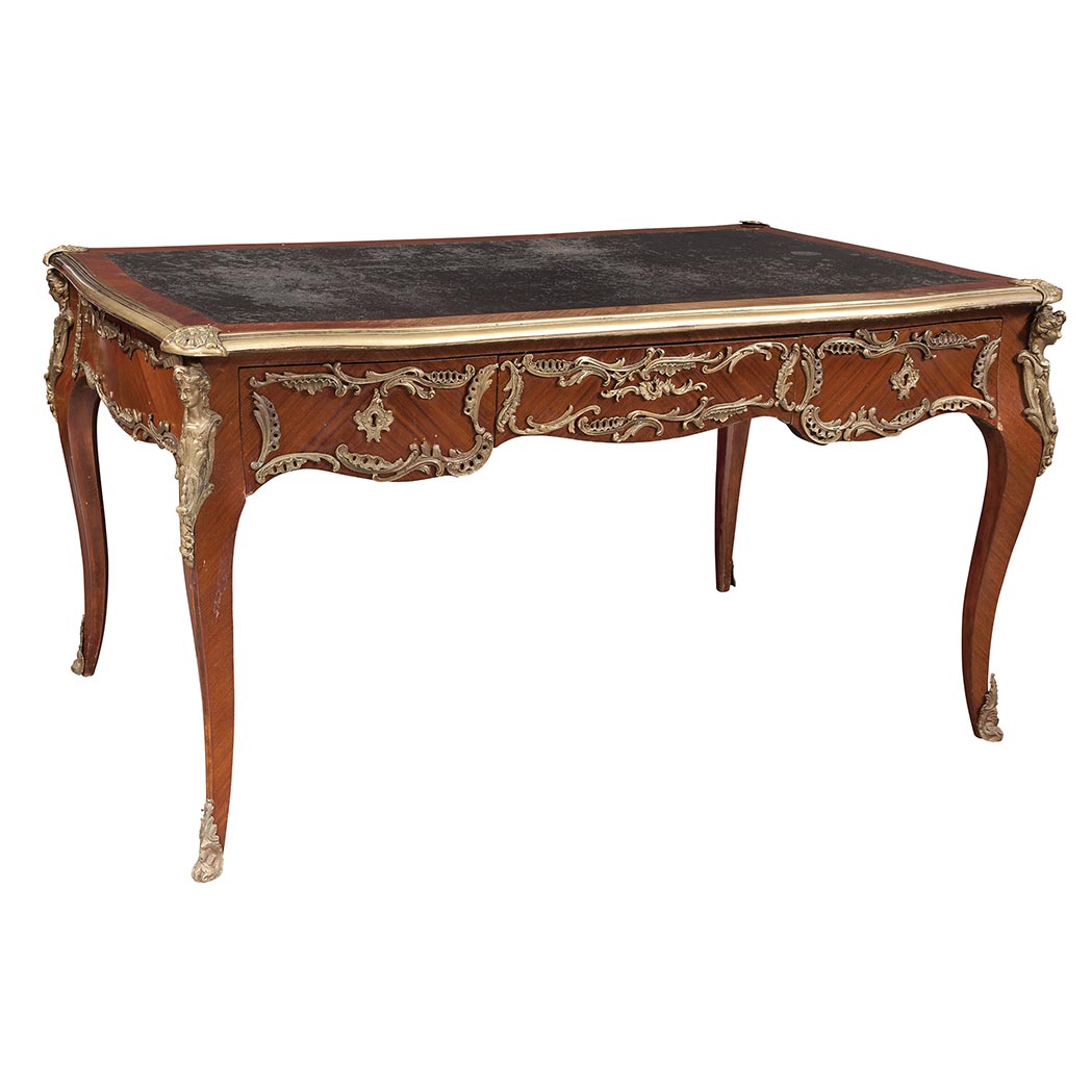 Appraisal: Louis XV Style Gilt-Metal Mounted Mahogany Bureau Plat The shaped