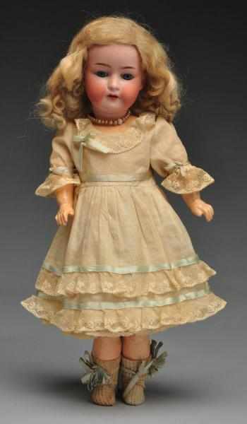 Appraisal: Lovely Ernst Heubach Child Doll Description German bisque socket head