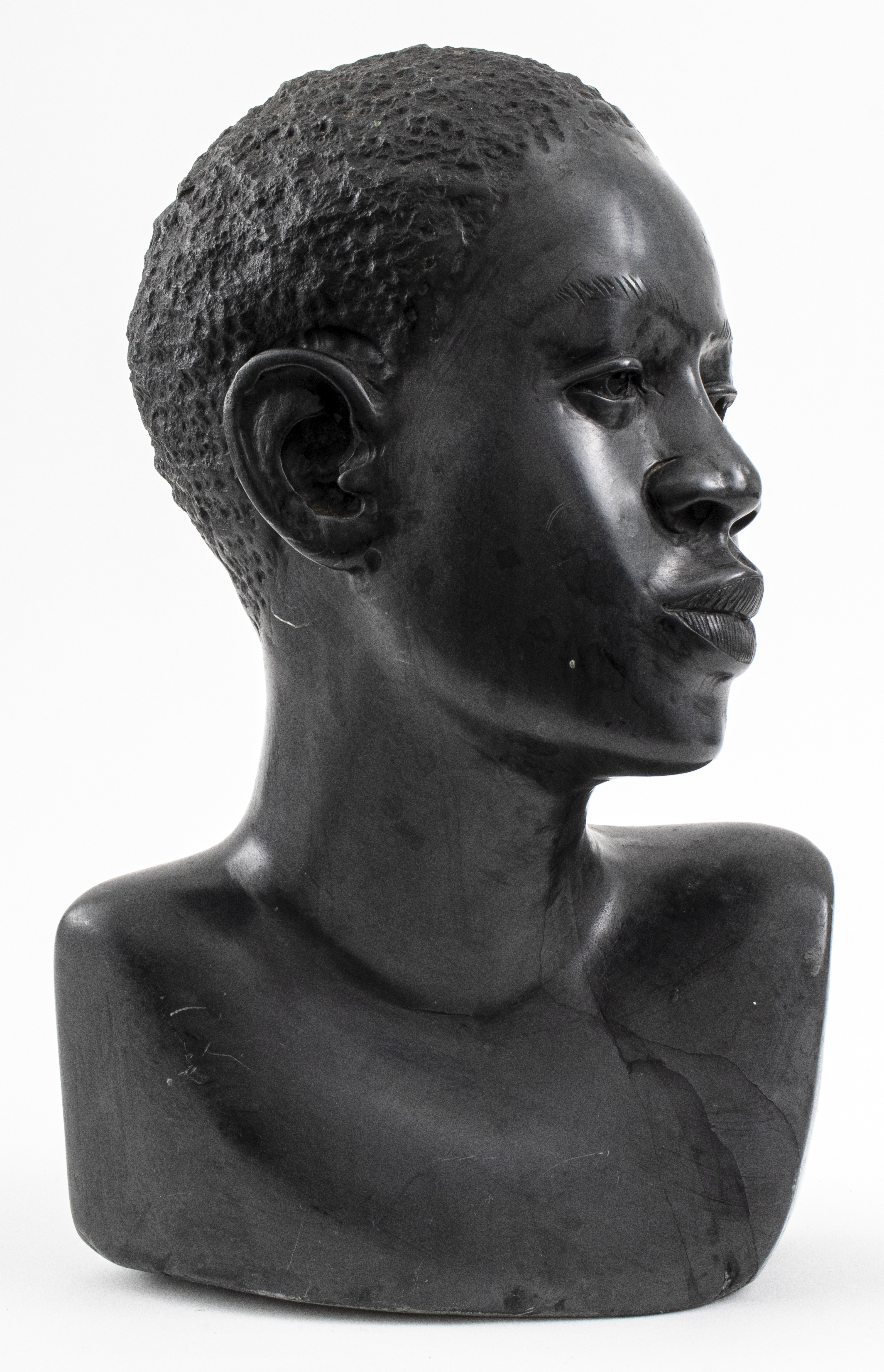 Appraisal: MARBLE BUST OF A YOUNG AFRICAN MAN SCULPTURE Marble bust