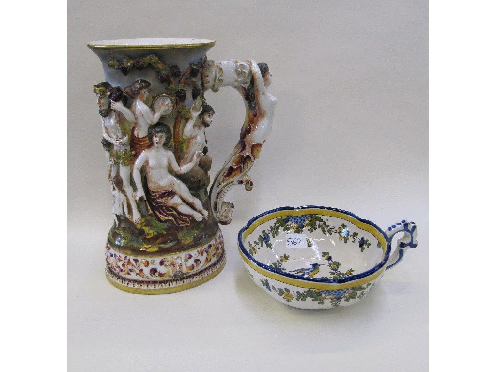 Appraisal: Capodimonte tankard with relief moulded decoration and a French tin