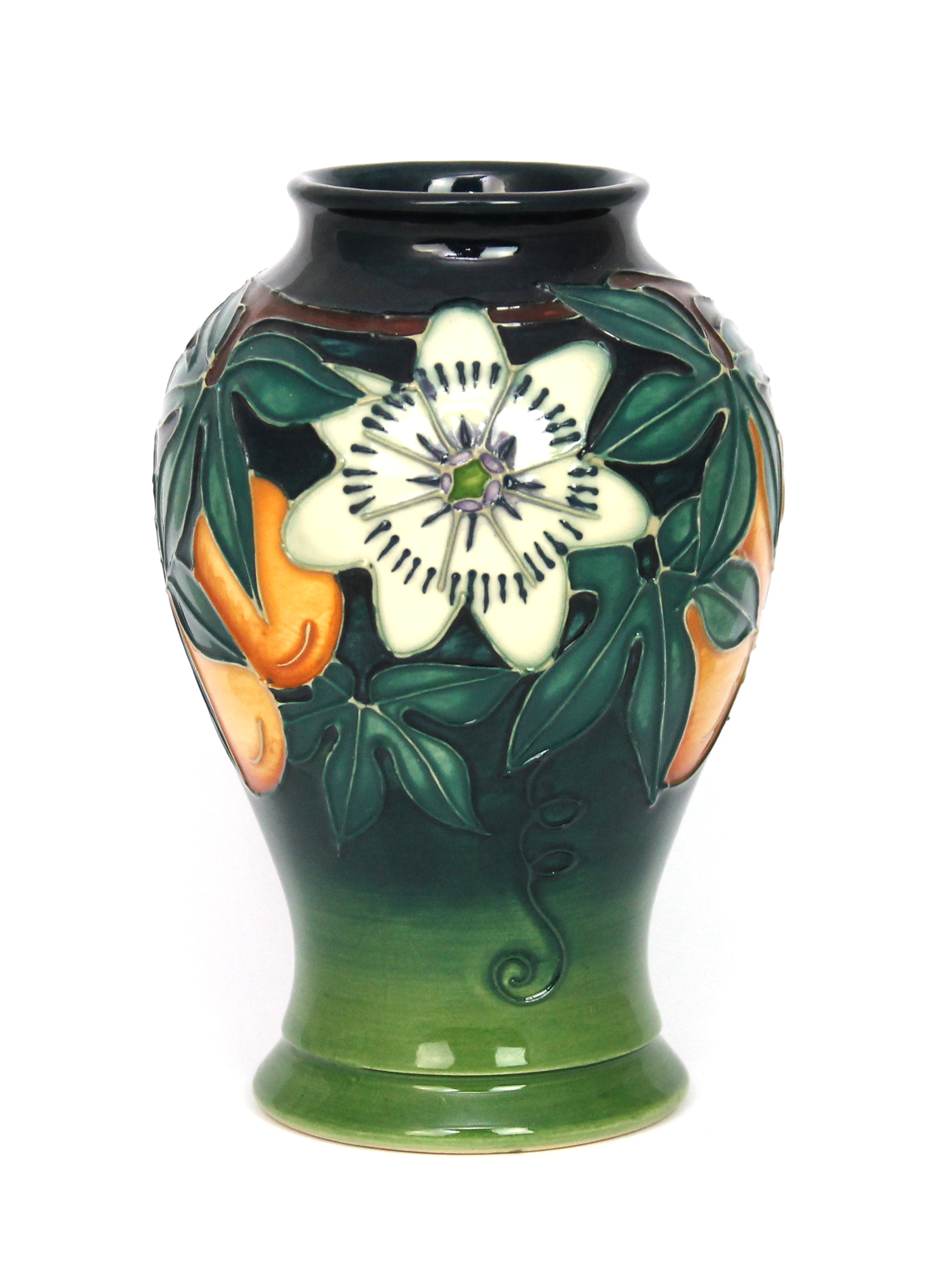 Appraisal: A Moorcroft pottery vase decorated with passion flowers against a