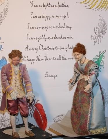 Appraisal: TWO MID- TH CENTURY DICKENSIAN AUTOMATONCHARACTERS VERY ELEGANTLY DRESSED COUPLE