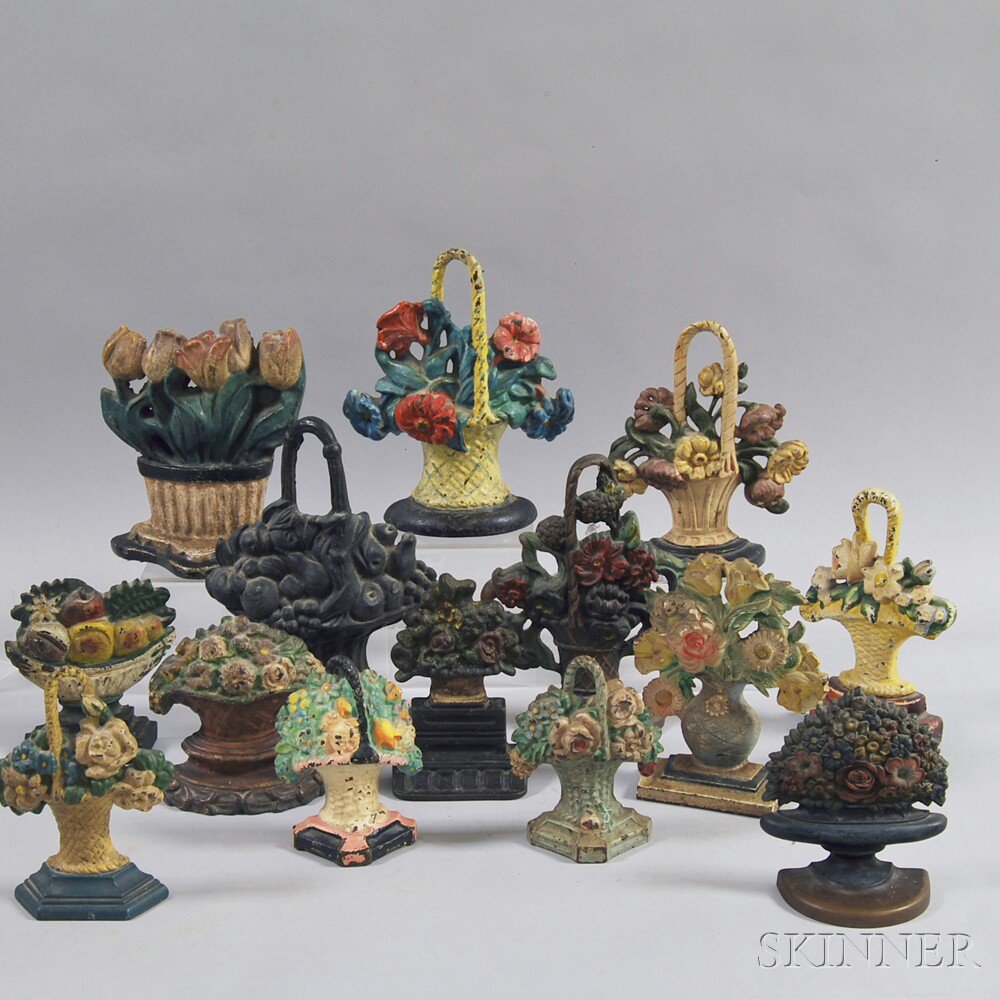 Appraisal: Fourteen Polychrome Floral Doorstops including an example by Bradley Hubbard