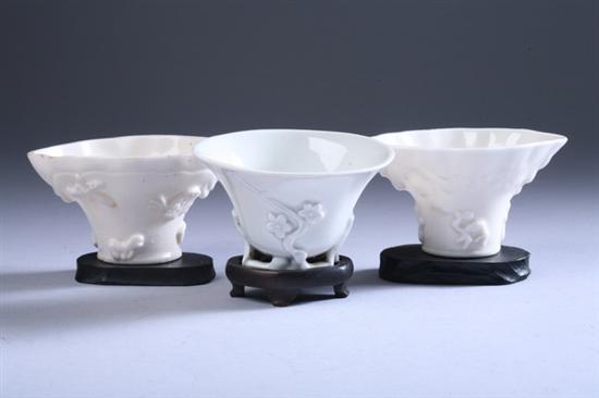 Appraisal: THREE CHINESE BLANC-DE-CHINE PORCELAIN LIBATION CUPS th century One with