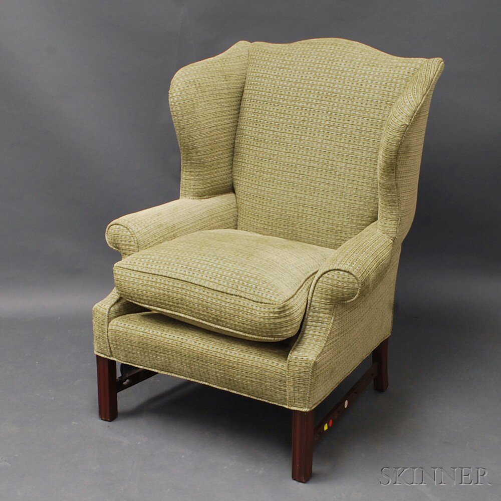 Appraisal: Chippendale-style Upholstered Mahogany Wing Chair with molded Marlborough legs and